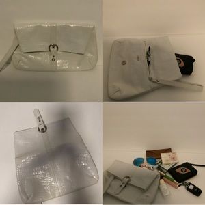 ✅🌟Embossed White Classy Clutch.